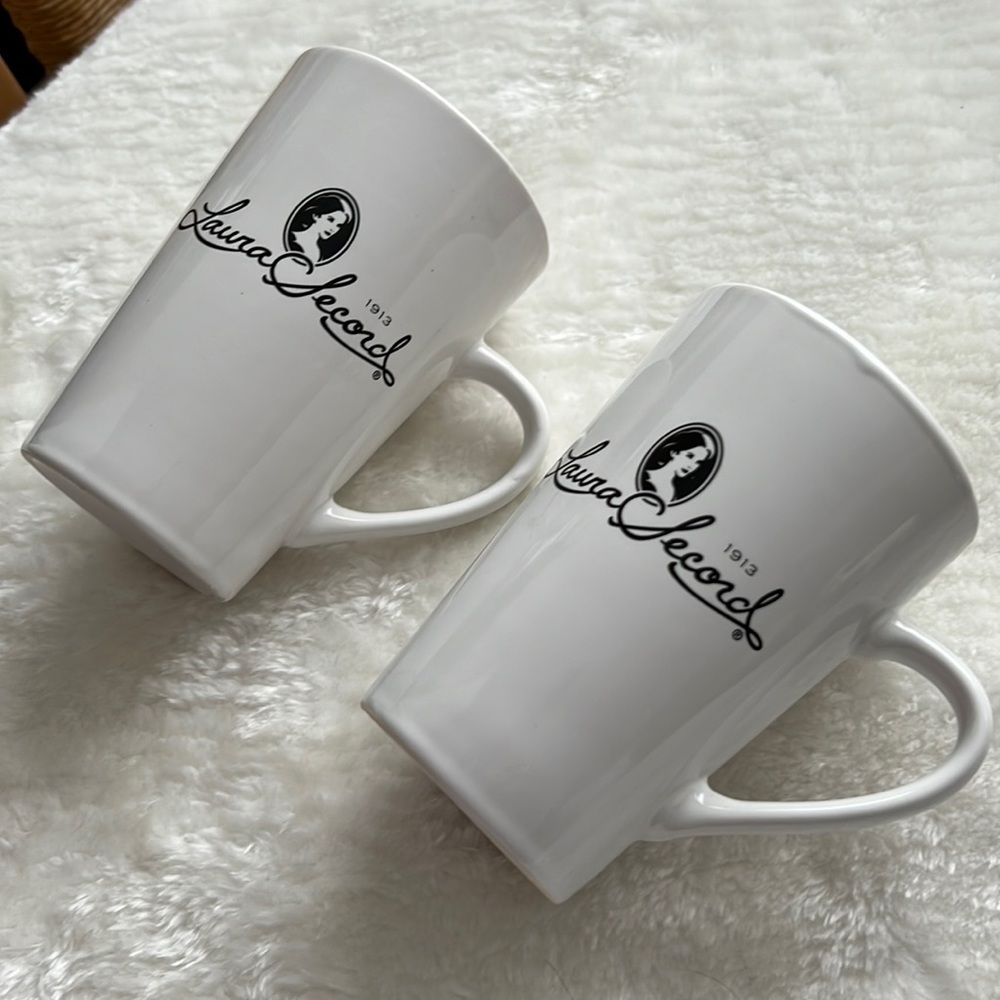 One pair white Laura Secord cups
